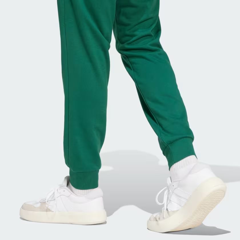 Adidas | Pantaloni Essentials Feel Confort French Terry Uomo Collegiate Green/Black - Fabbrica Ski Sises