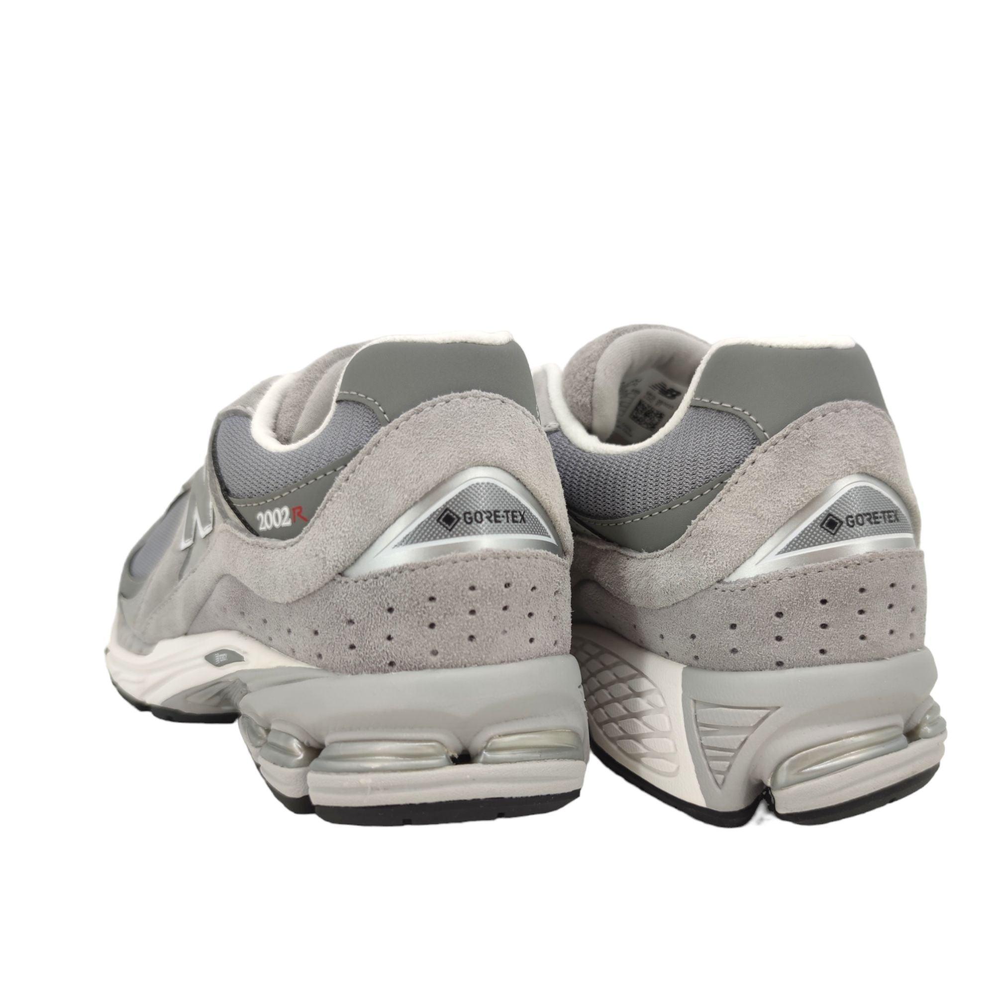 New Balance | Scarpe 2002R Steel/Lead Red - Fabbrica Ski Sises