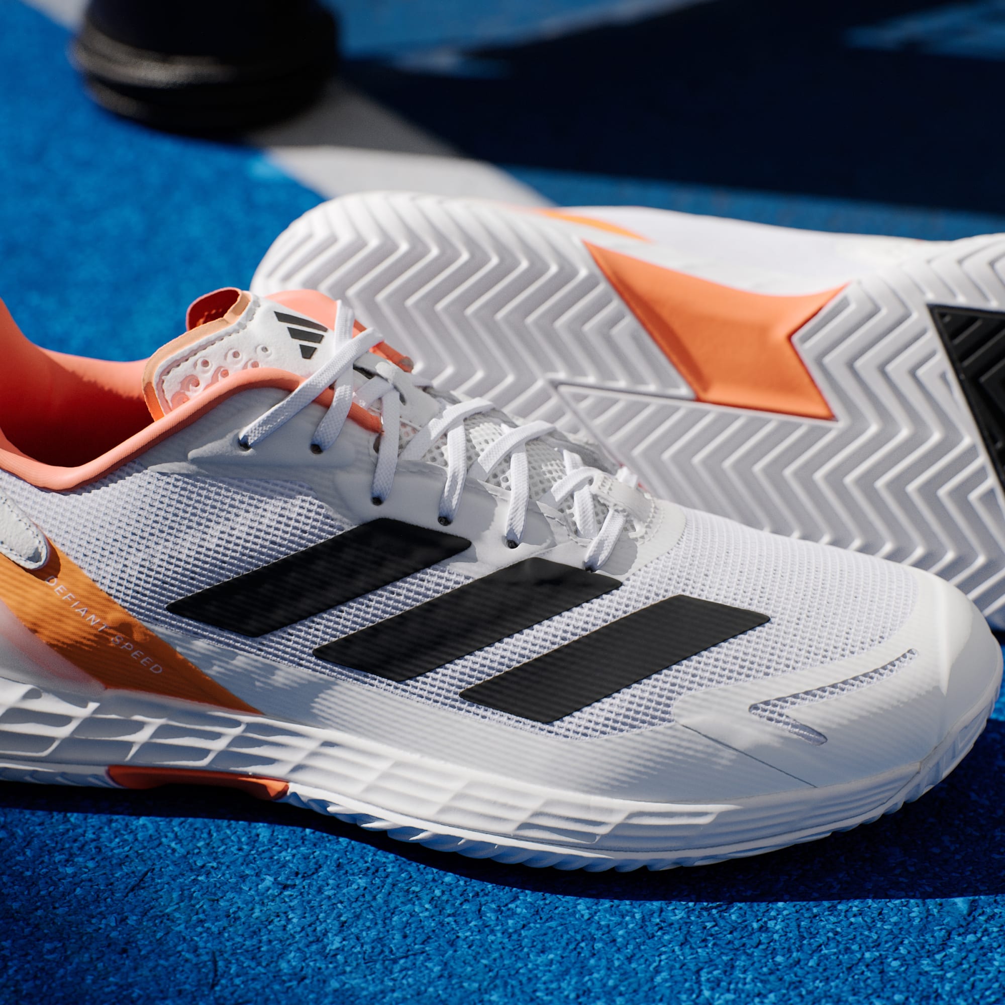 Zapatos de tenis Defiant Speed 2 Hombre Cloud White/Core Black/Lucid Orange