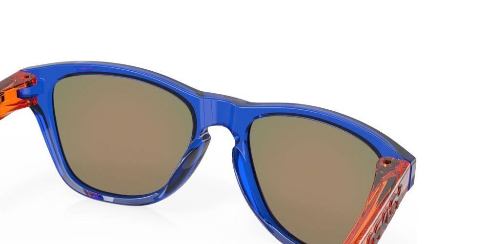 Oakley | Occhiali Frogskins XXS Junior Crystal Blue/Prizm Ruby - Fabbrica Ski Sises